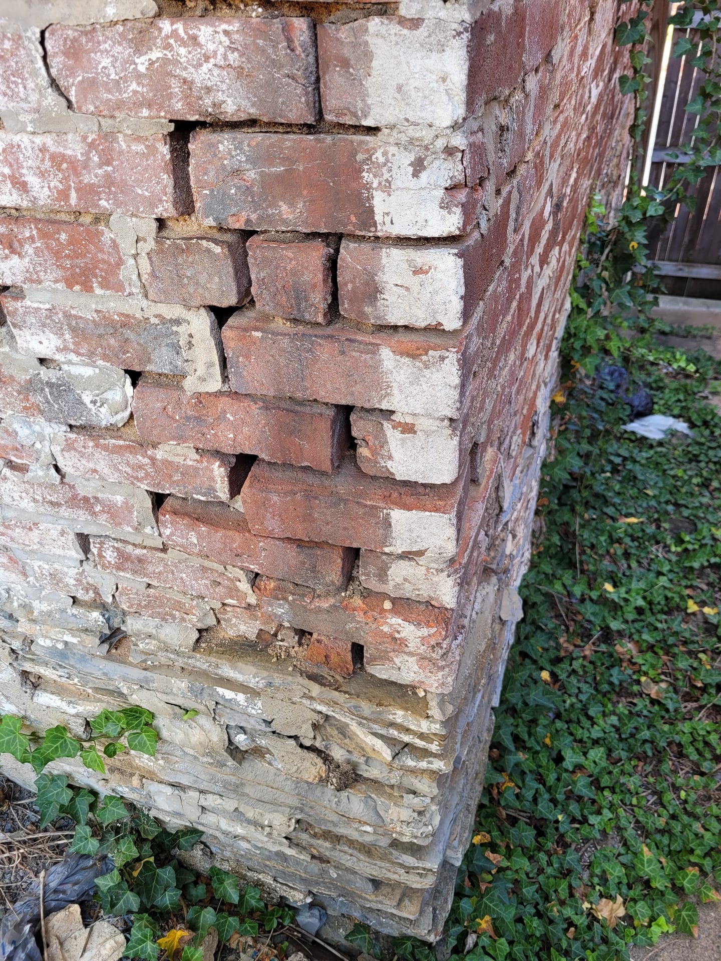 Exterior foundation brick missing mortar requiring masonry waterproofing