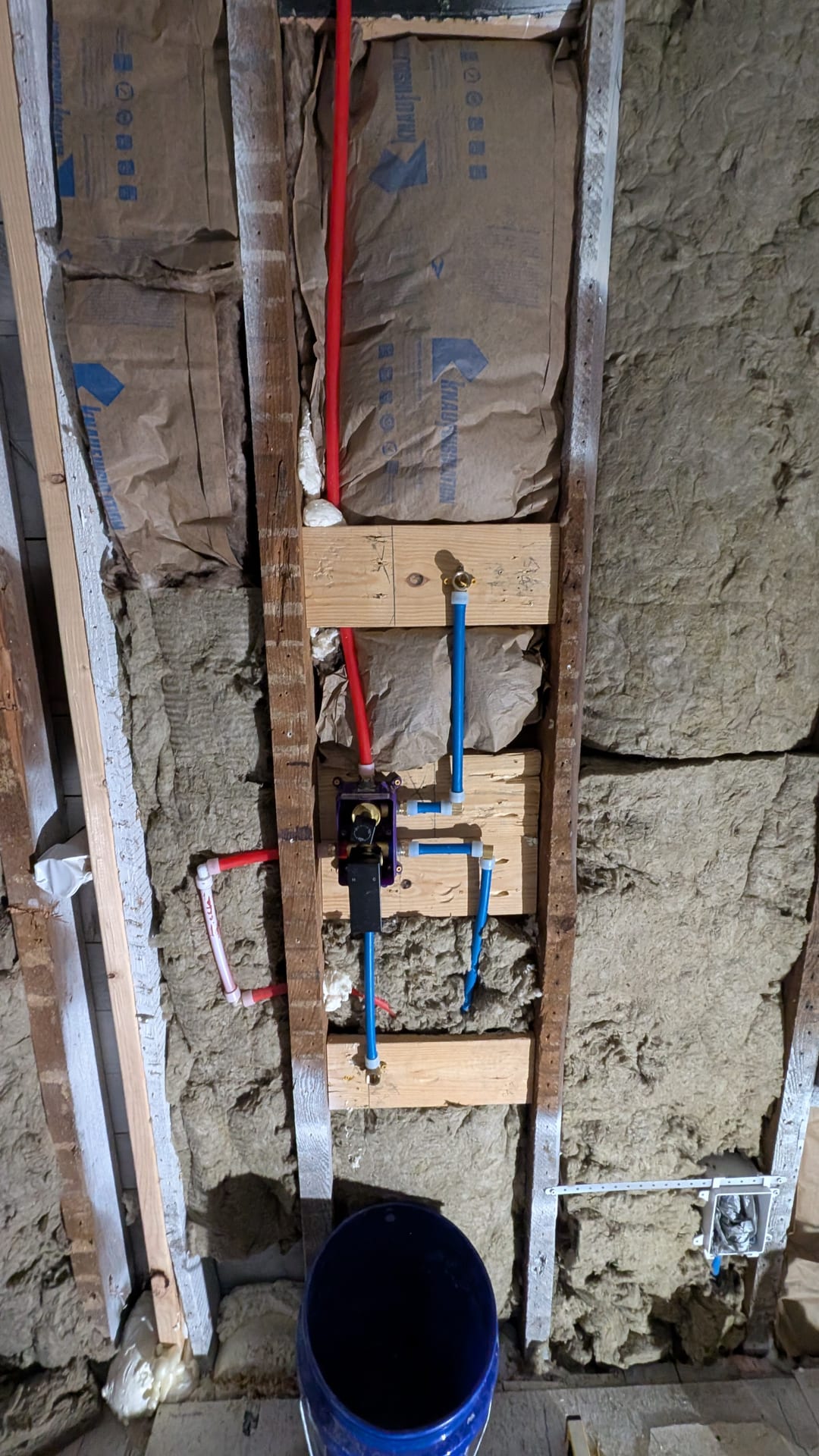 Shower valve plumbing rough-in during bathroom rebuild